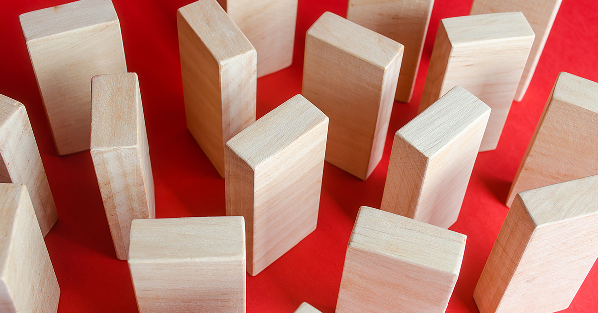 Wooden blocks on a red background